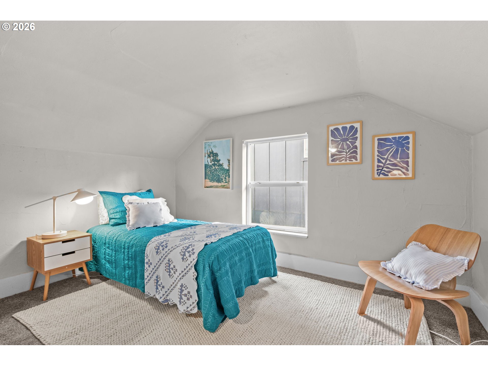 326 Pearl Street Oregon City, OR 97045 - Photo 29 of 36 a bedroom with a bed and a chair in it