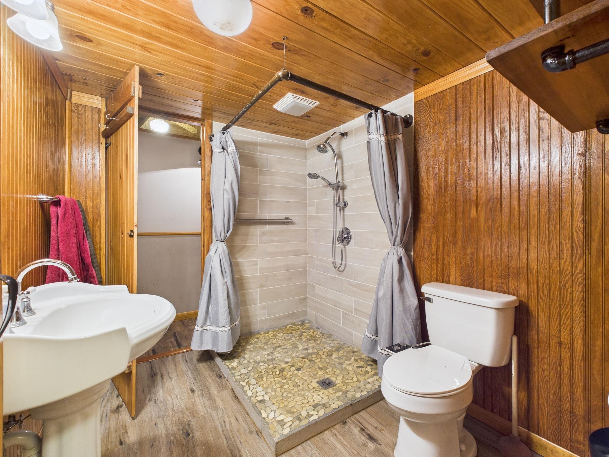 56 Basin Street Lorida, FL 33857 - Photo 21 of 42 a bathroom with a sink toilet and shower