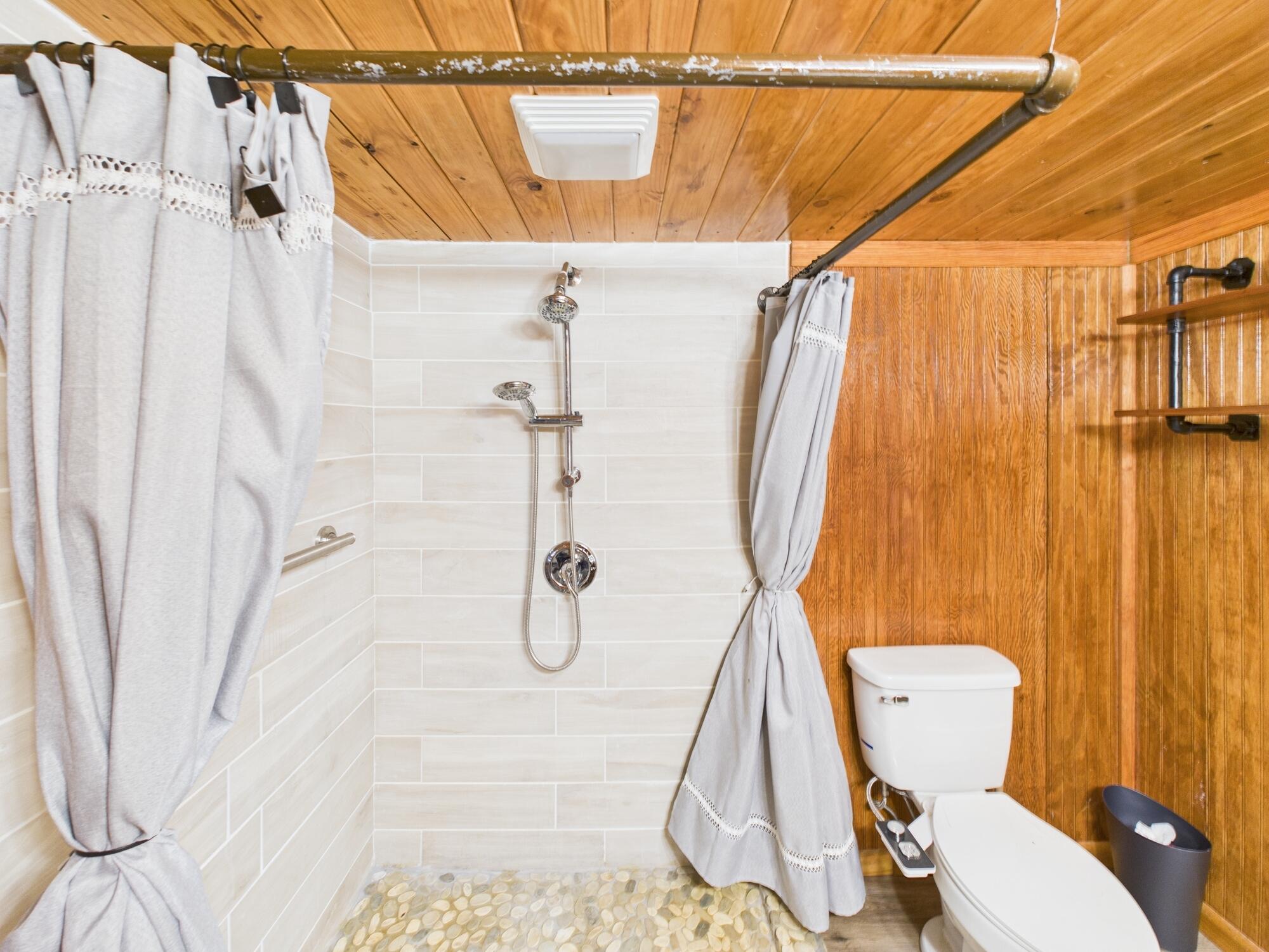 56 Basin Street Lorida, FL 33857 - Photo 22 of 42 a bathroom with a toilet and a shower