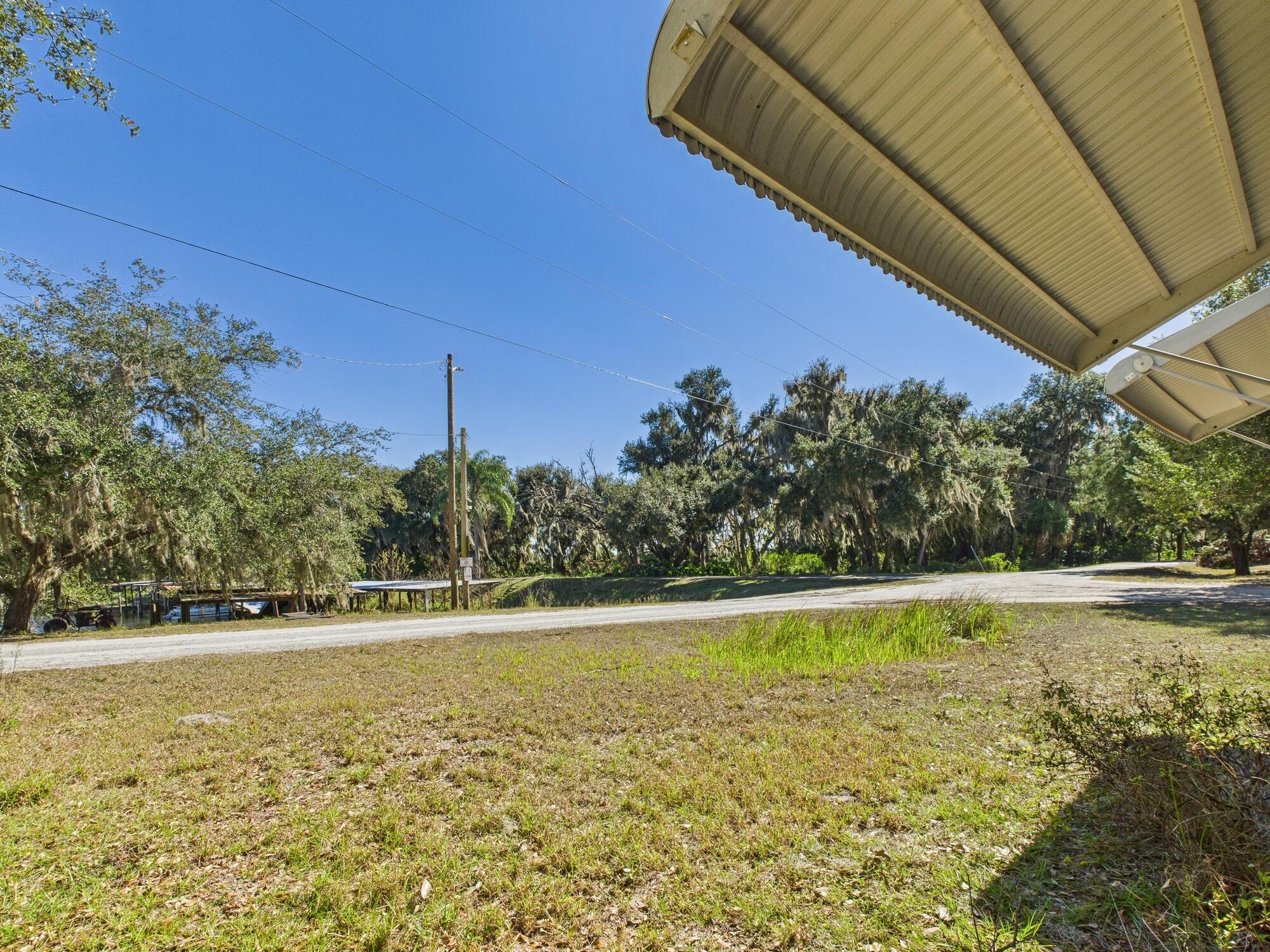 56 Basin Street Lorida, FL 33857 - Photo 39 of 42 a view of a swimming pool and an outdoor space
