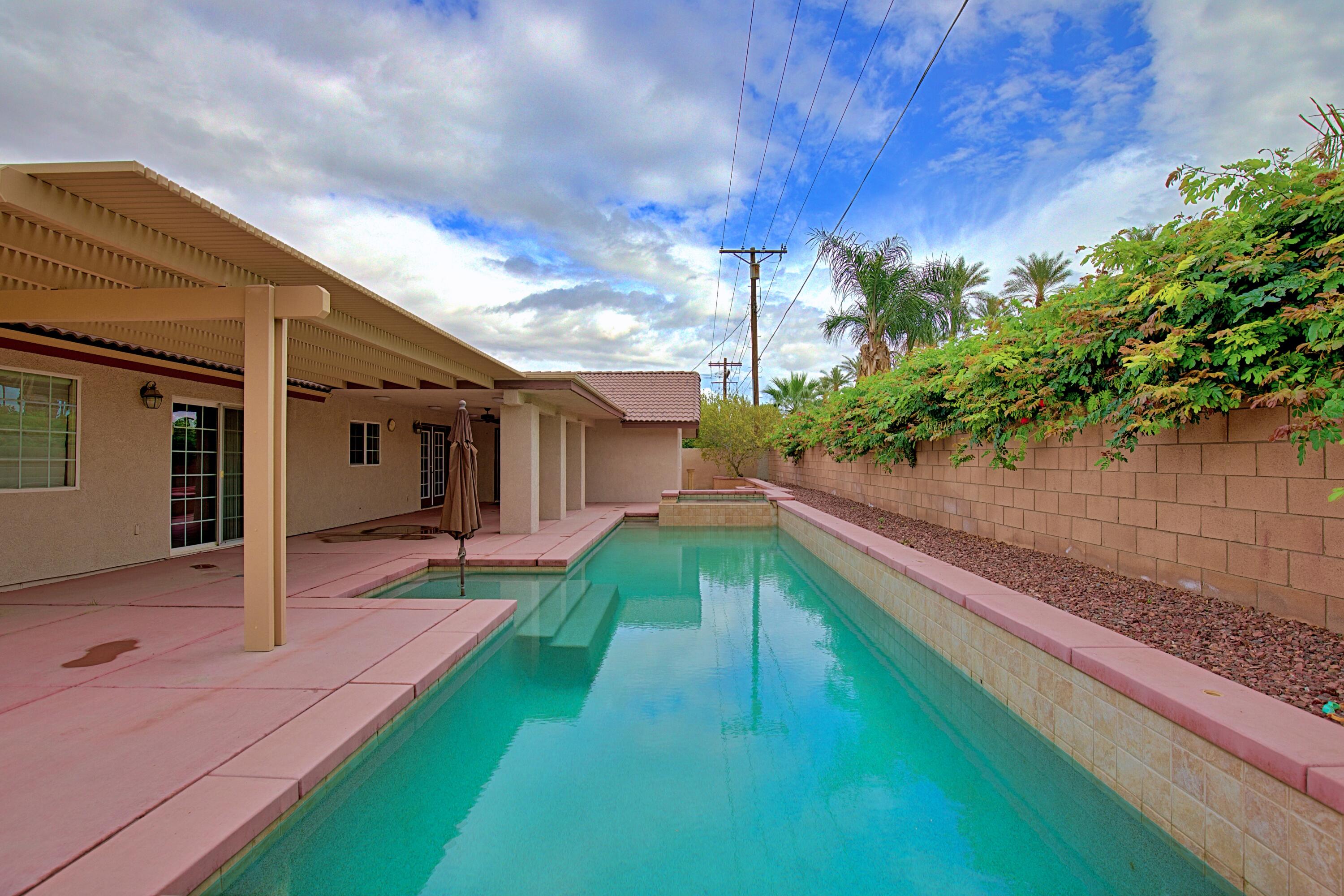 80025 Kingston Drive Bermuda Dunes, CA 92203 - Photo 22 of 27 a house view with a backyard space