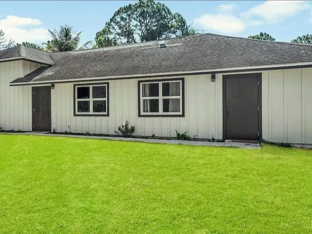 front view of house with a yard