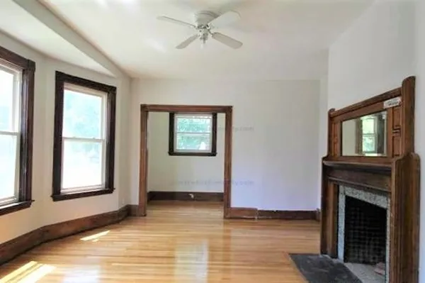 a living room with a fireplace