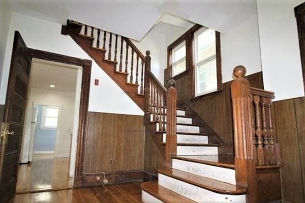 32 Mansfield Street Boston, MA 02134 - Photo 8 of 20 a view of entryway and hall with wooden floor