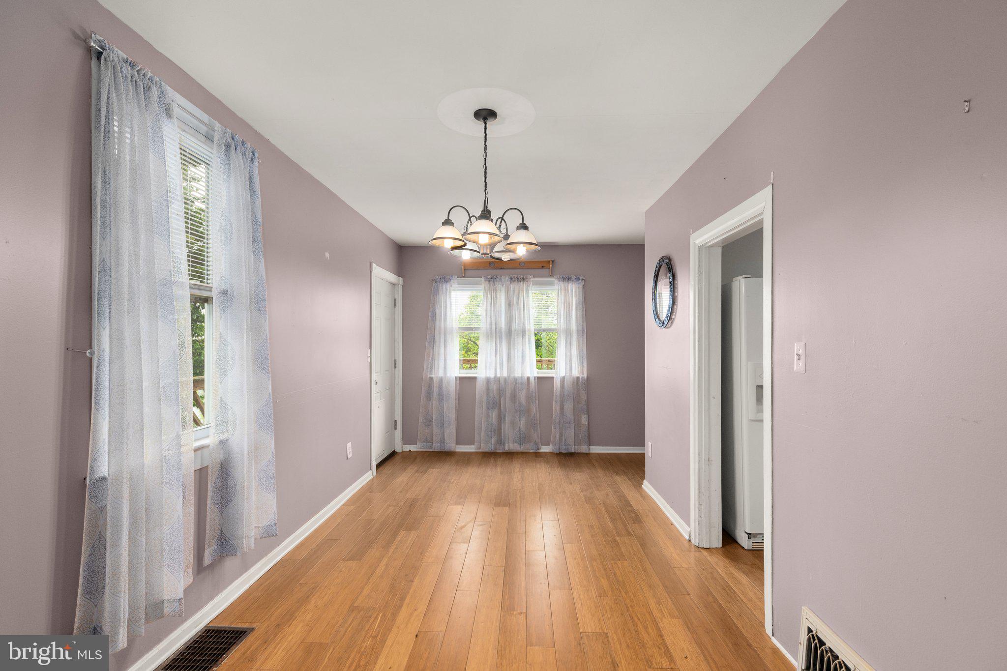 905 Chestnut Street Delta, PA 17314 - Photo 12 of 28 DINING ROOM WITH LAMINATE FLOORS !!