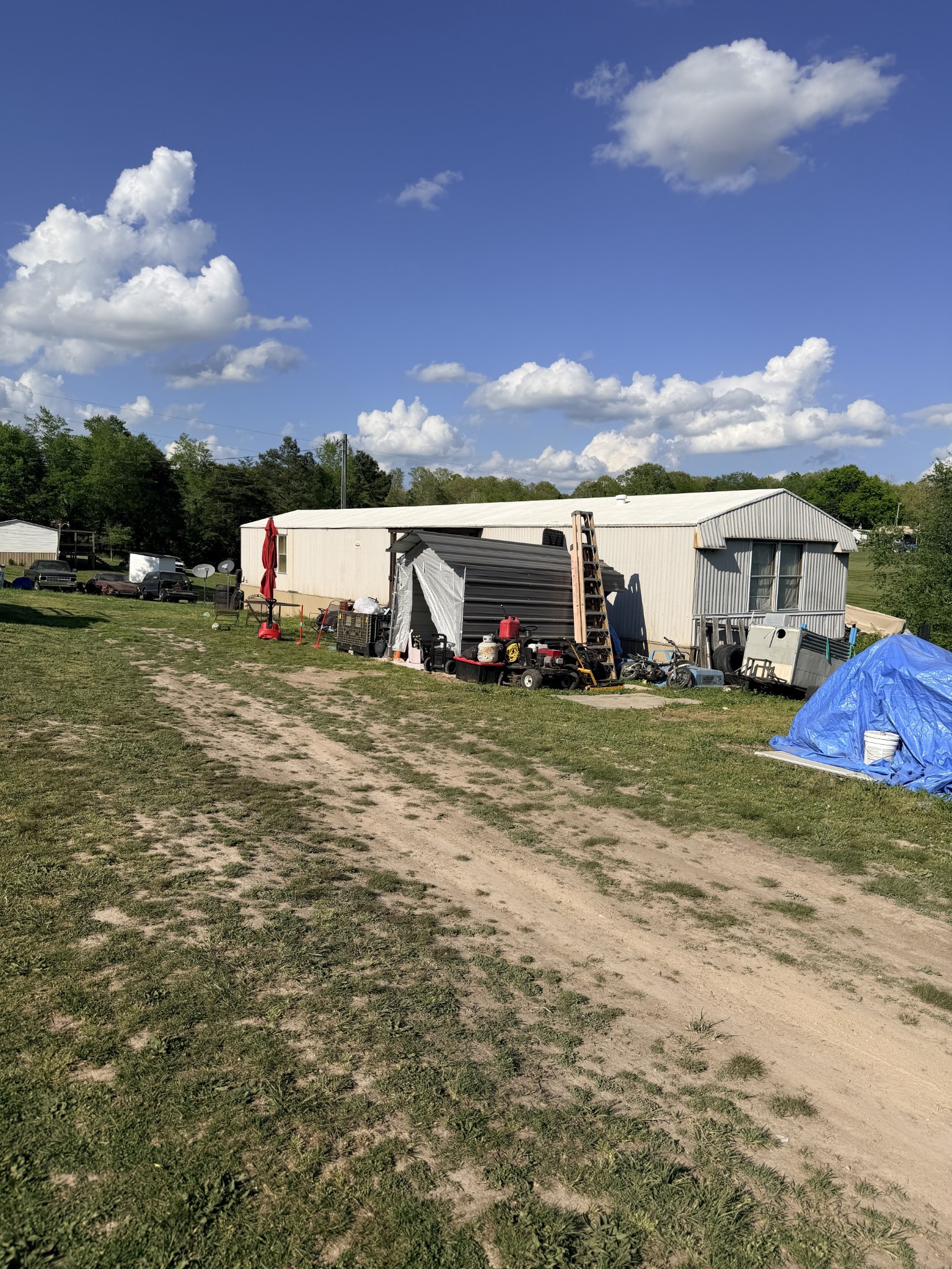 940 North Brace Road Summertown, TN 38483 - Photo 21 of 21 a view of a car park next to a yard