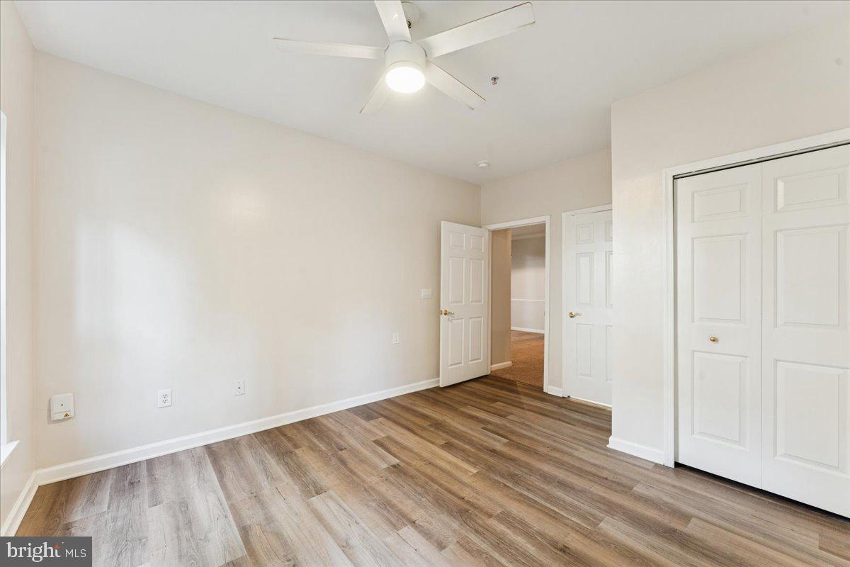 2000 Connor Court, Unit 705C Bowie, MD 20721 - Photo 16 of 28 wooden floor in an empty room