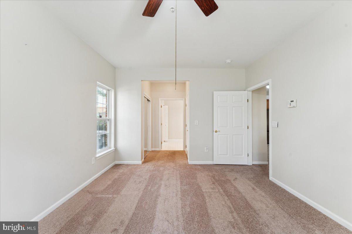 2000 Connor Court, Unit 705C Bowie, MD 20721 - Photo 19 of 28 a view of an empty room and window