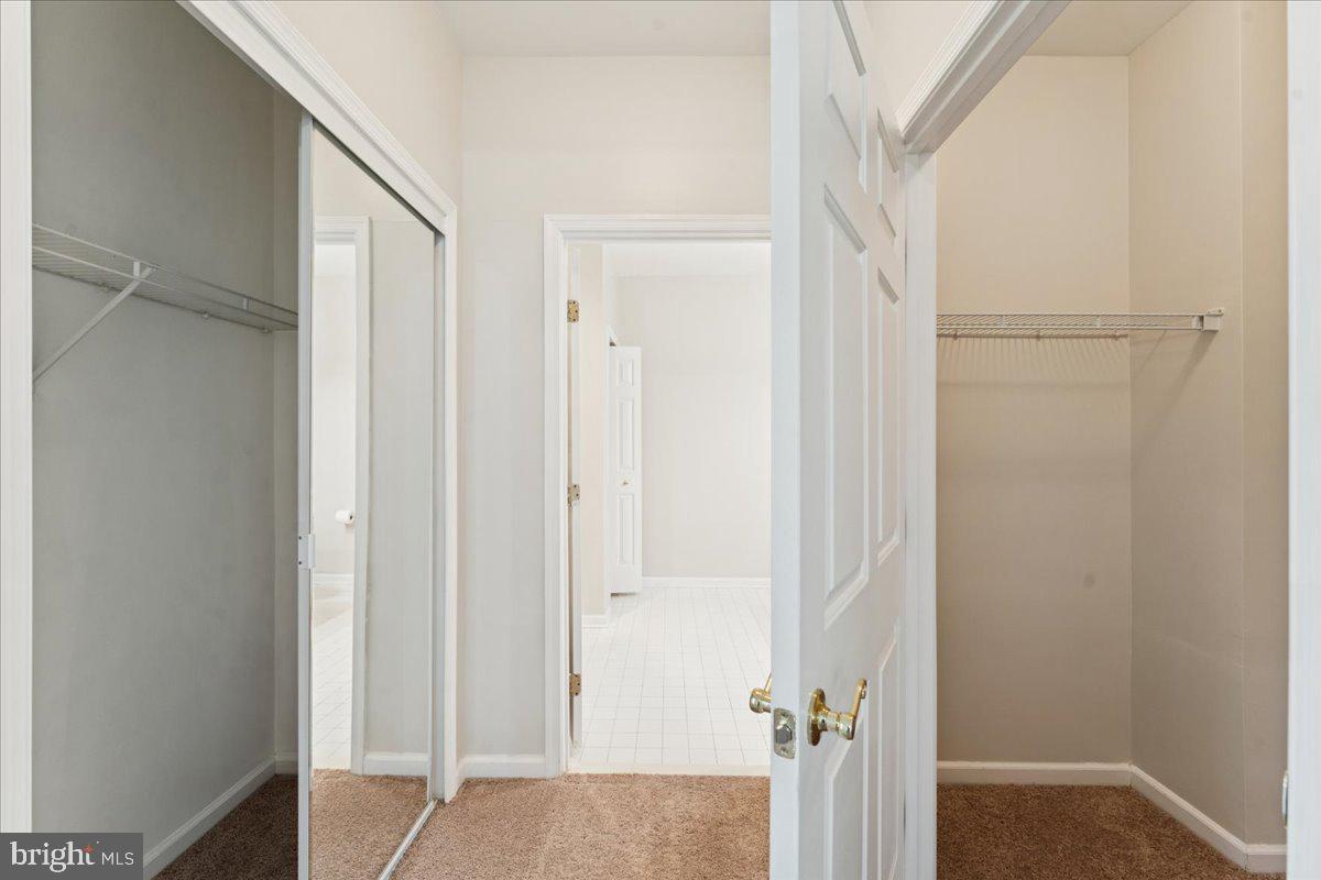 2000 Connor Court, Unit 705C Bowie, MD 20721 - Photo 20 of 28 a view of a hallway with closet and door