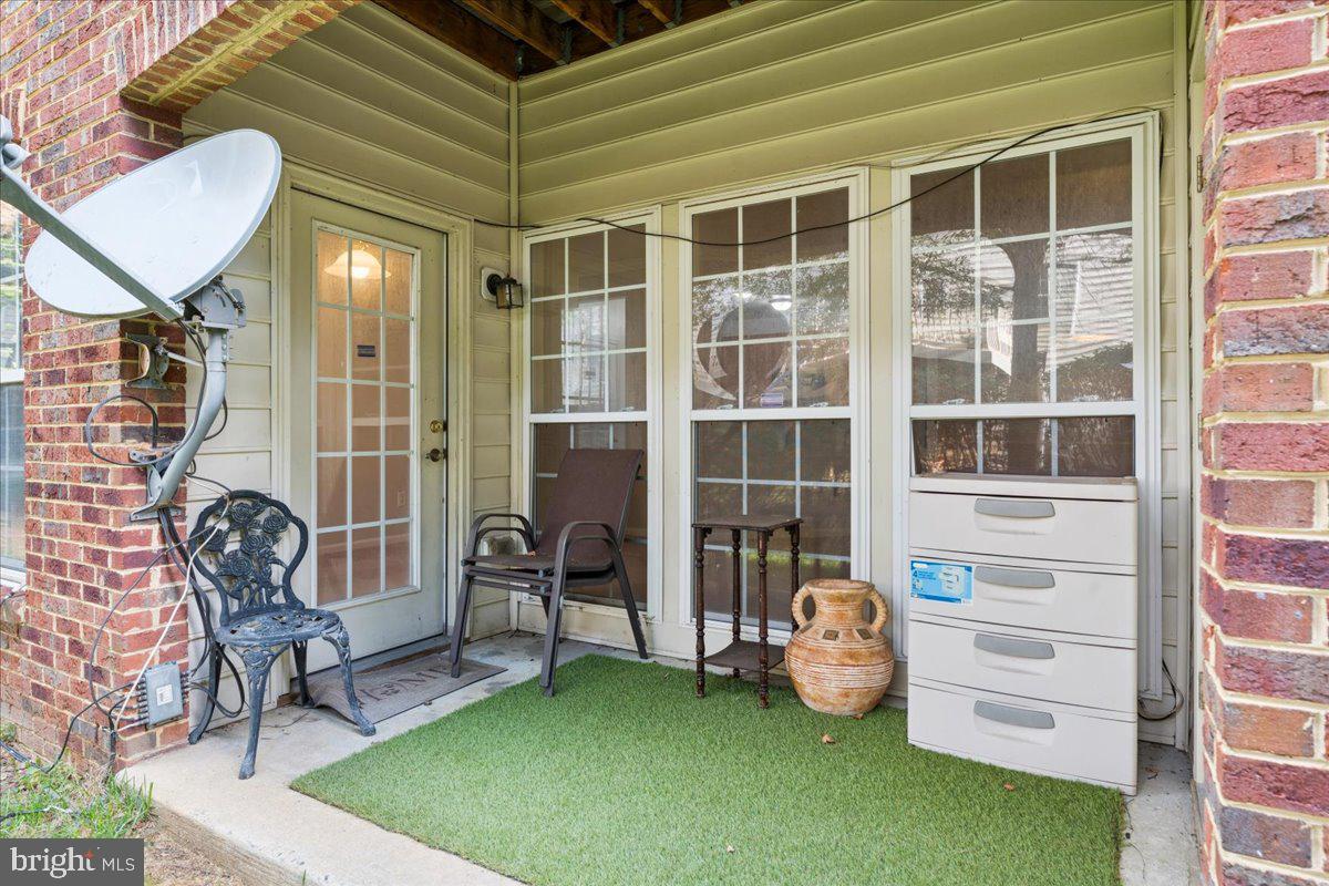 2000 Connor Court, Unit 705C Bowie, MD 20721 - Photo 27 of 28 a front view of a house with patio