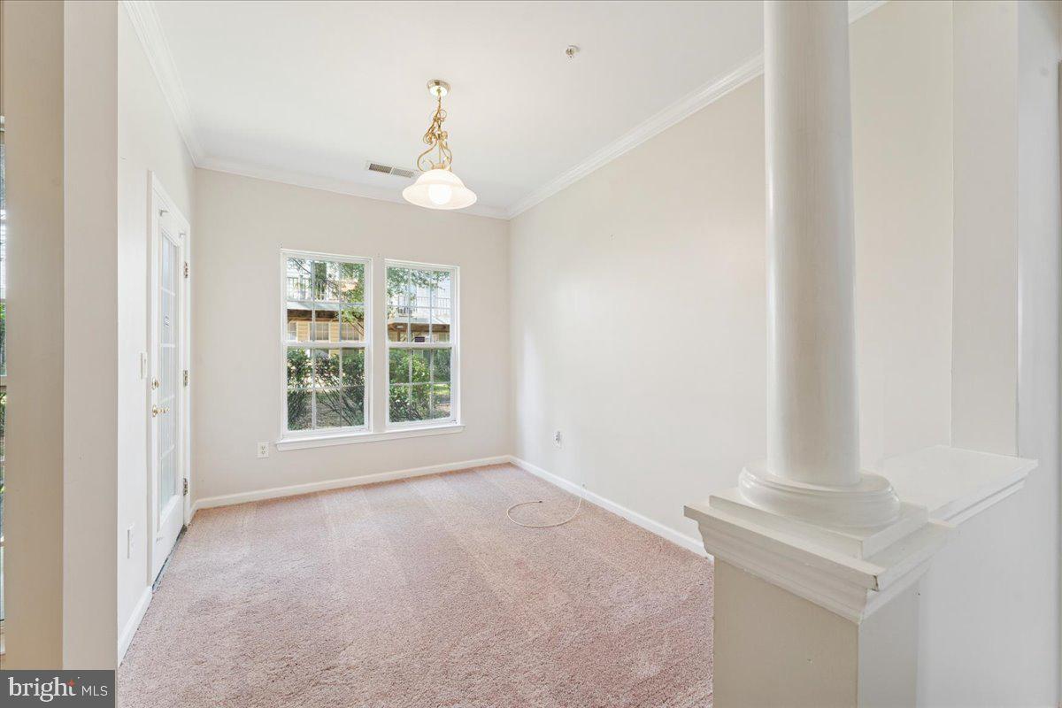 2000 Connor Court, Unit 705C Bowie, MD 20721 - Photo 8 of 28 a view of an empty room with a window