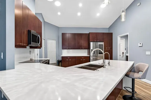 a bedroom with a bed and a television in it