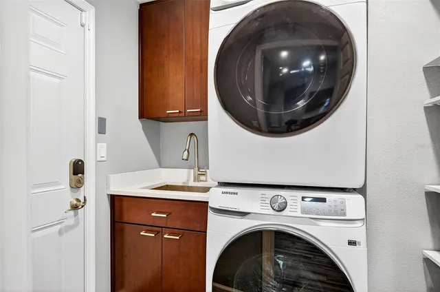 a utility room with dryer and washer