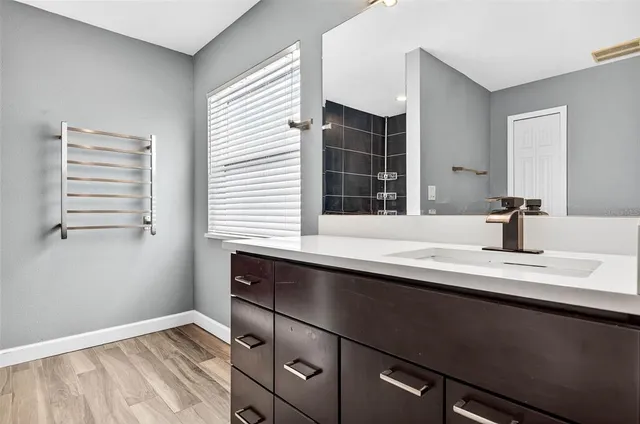 a kitchen with a sink and a window