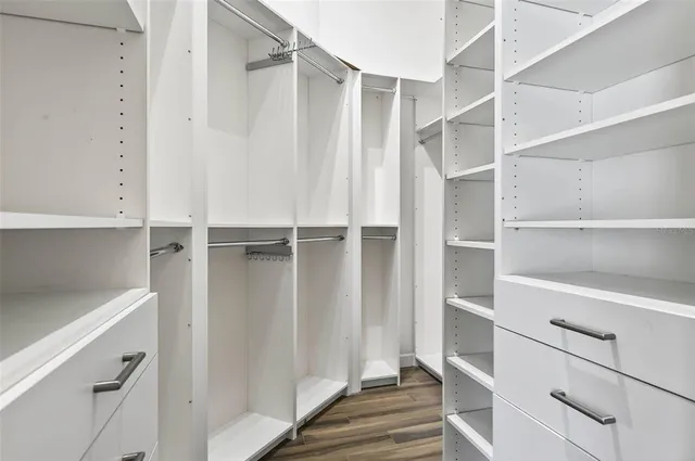a view of a porch with furniture and a yard