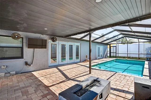 a view of a backyard with a patio