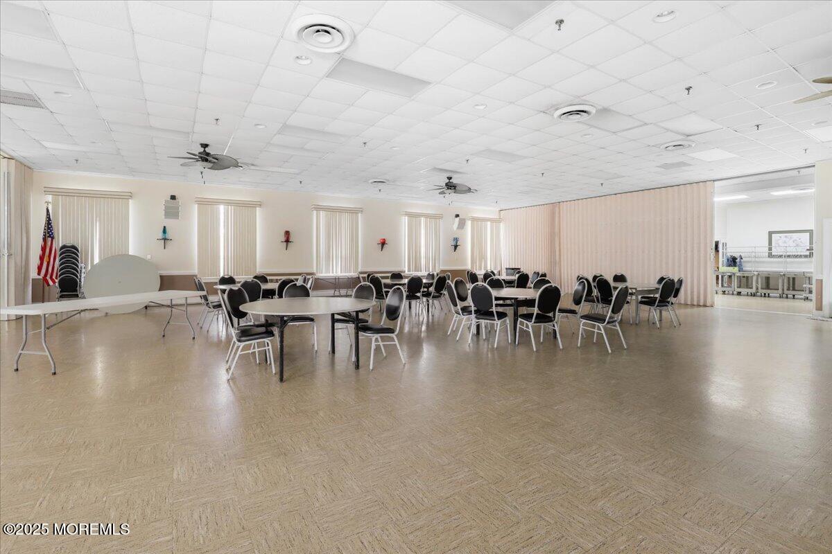 12 Lamb Road Brick, NJ 08724 - Photo 39 of 43 a gym with lots of table and chairs