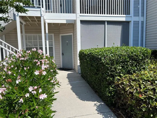 a view of a pathway with a house