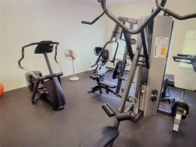 a couple of bicycles are parked next to a window