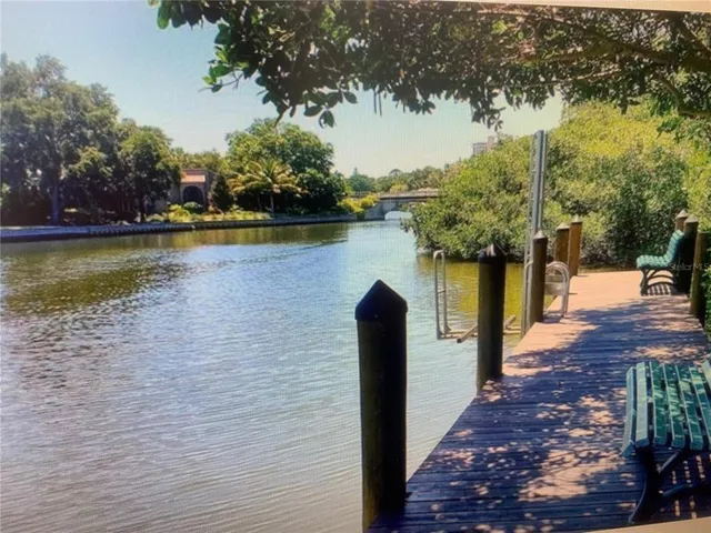 a side view of a house with a yard