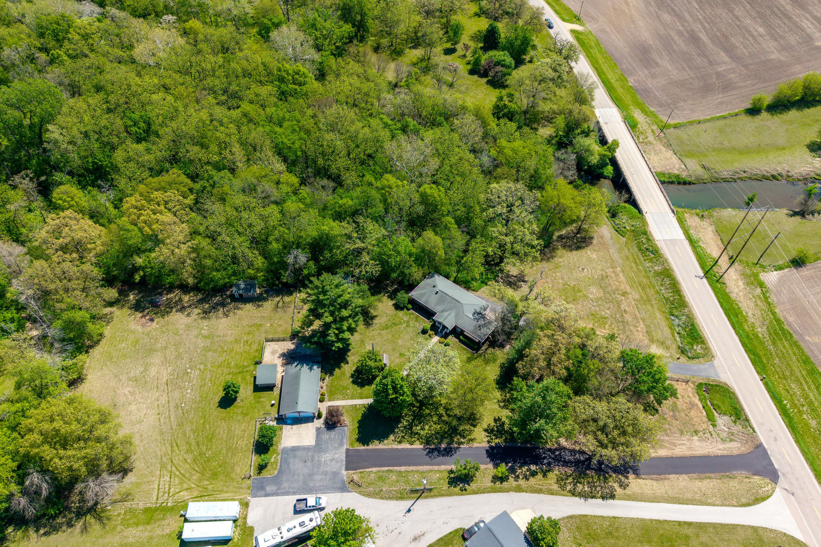 2660 252nd Street De Witt, IA 52742 - Photo 42 of 45 an aerial view of residential houses with outdoor space