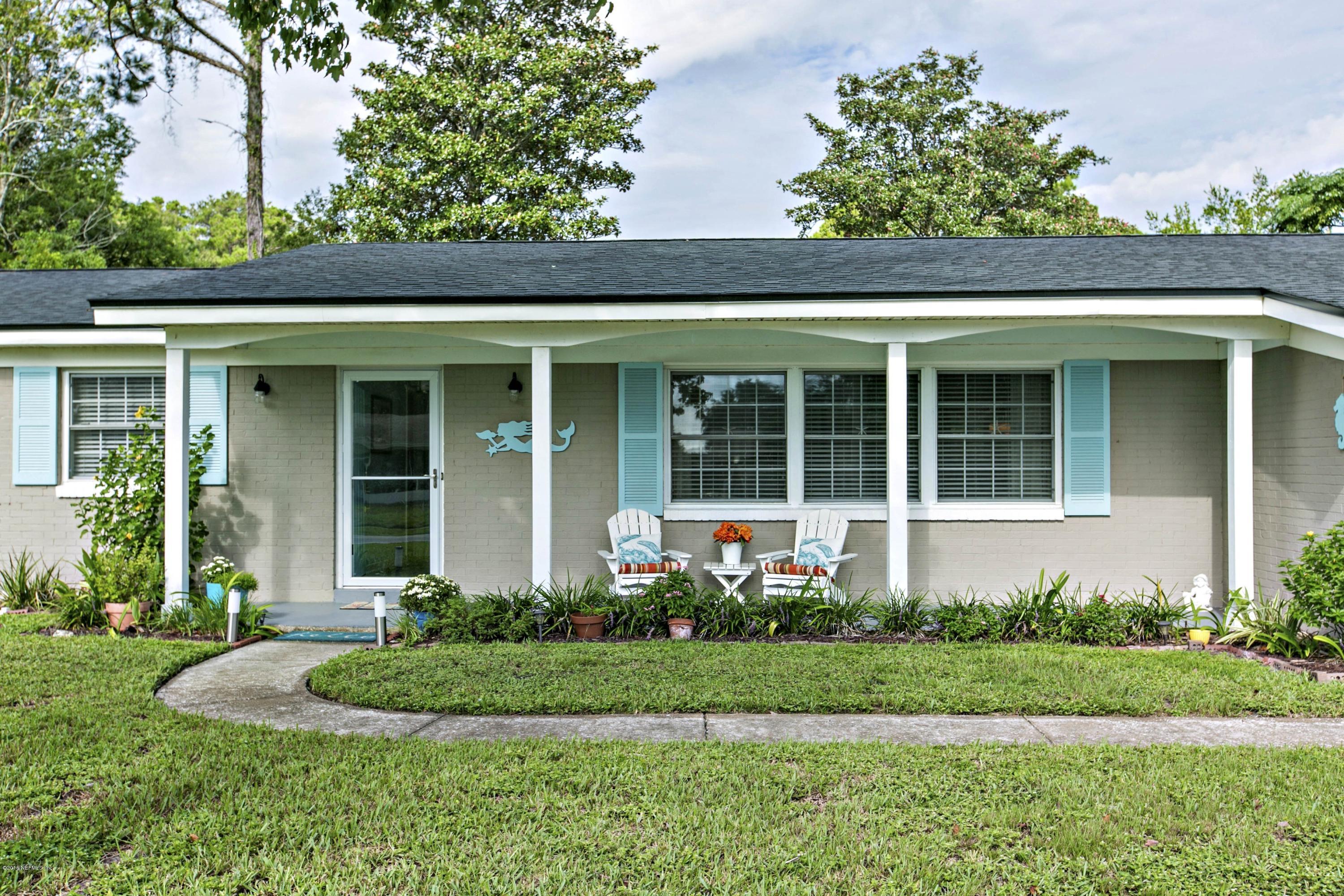 4034 Eunice Road Jacksonville, FL 32250 - Photo 2 of 24 front view of a house with a yard