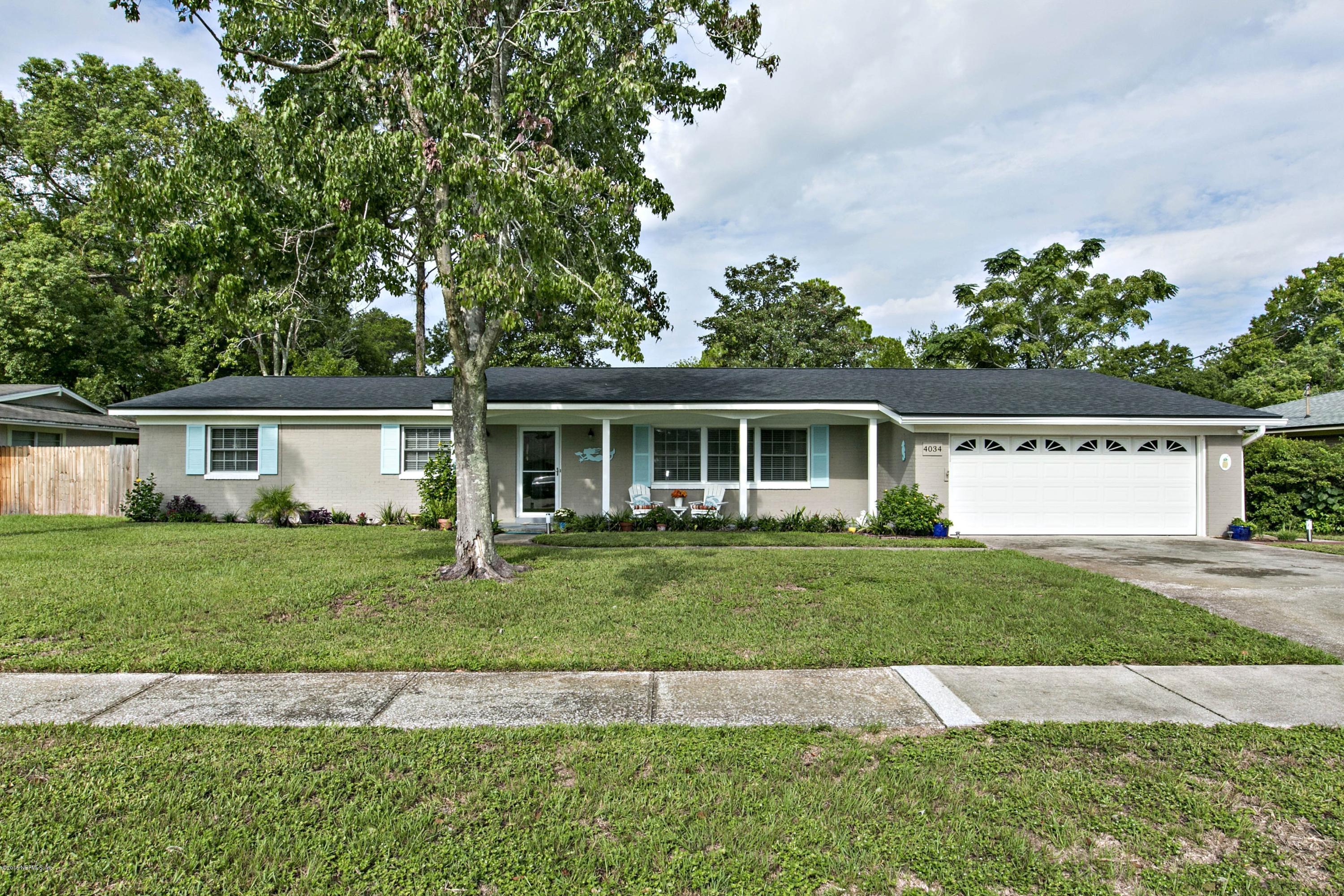4034 Eunice Road Jacksonville, FL 32250 - Photo 23 of 24 front view of a house with a yard