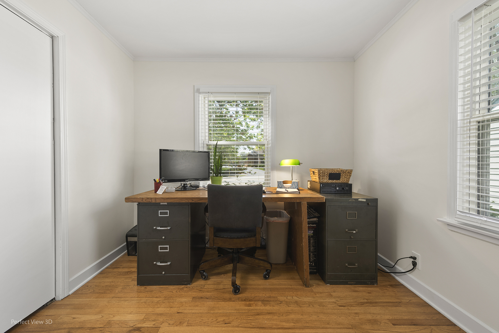 1020 Mitchell Avenue Elmhurst, IL 60126 - Photo 12 of 44 a view of workspace with furniture and window