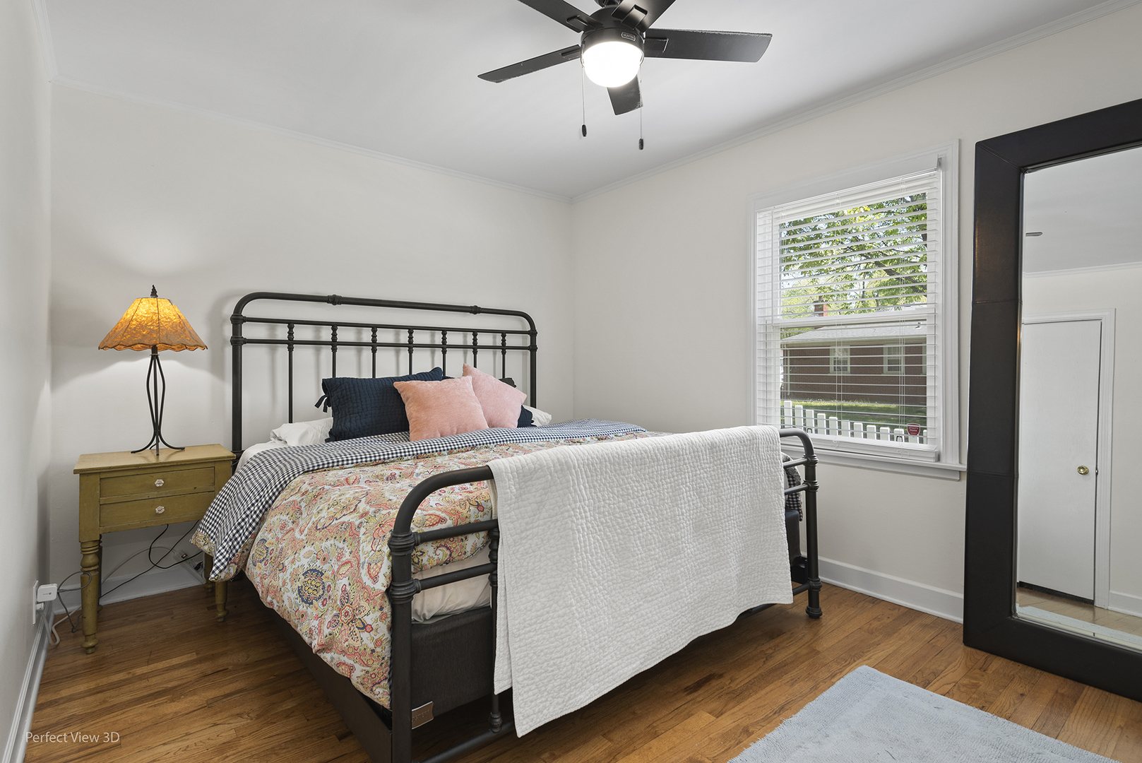 1020 Mitchell Avenue Elmhurst, IL 60126 - Photo 13 of 44 a bedroom with a bed and window