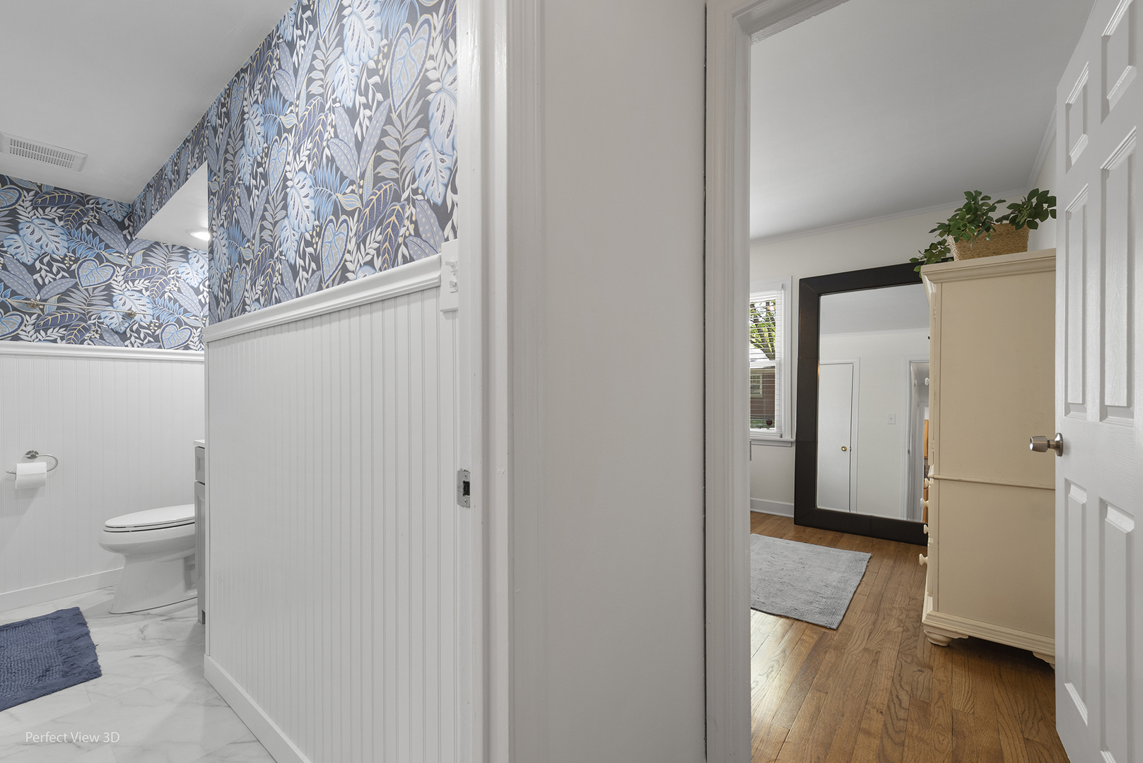 1020 Mitchell Avenue Elmhurst, IL 60126 - Photo 15 of 44 a view of a bathroom from a hallway