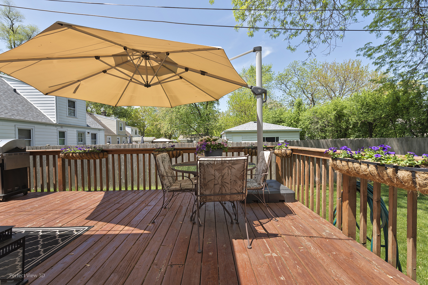 1020 Mitchell Avenue Elmhurst, IL 60126 - Photo 26 of 44 a view of balcony with wooden floor and umbrella
