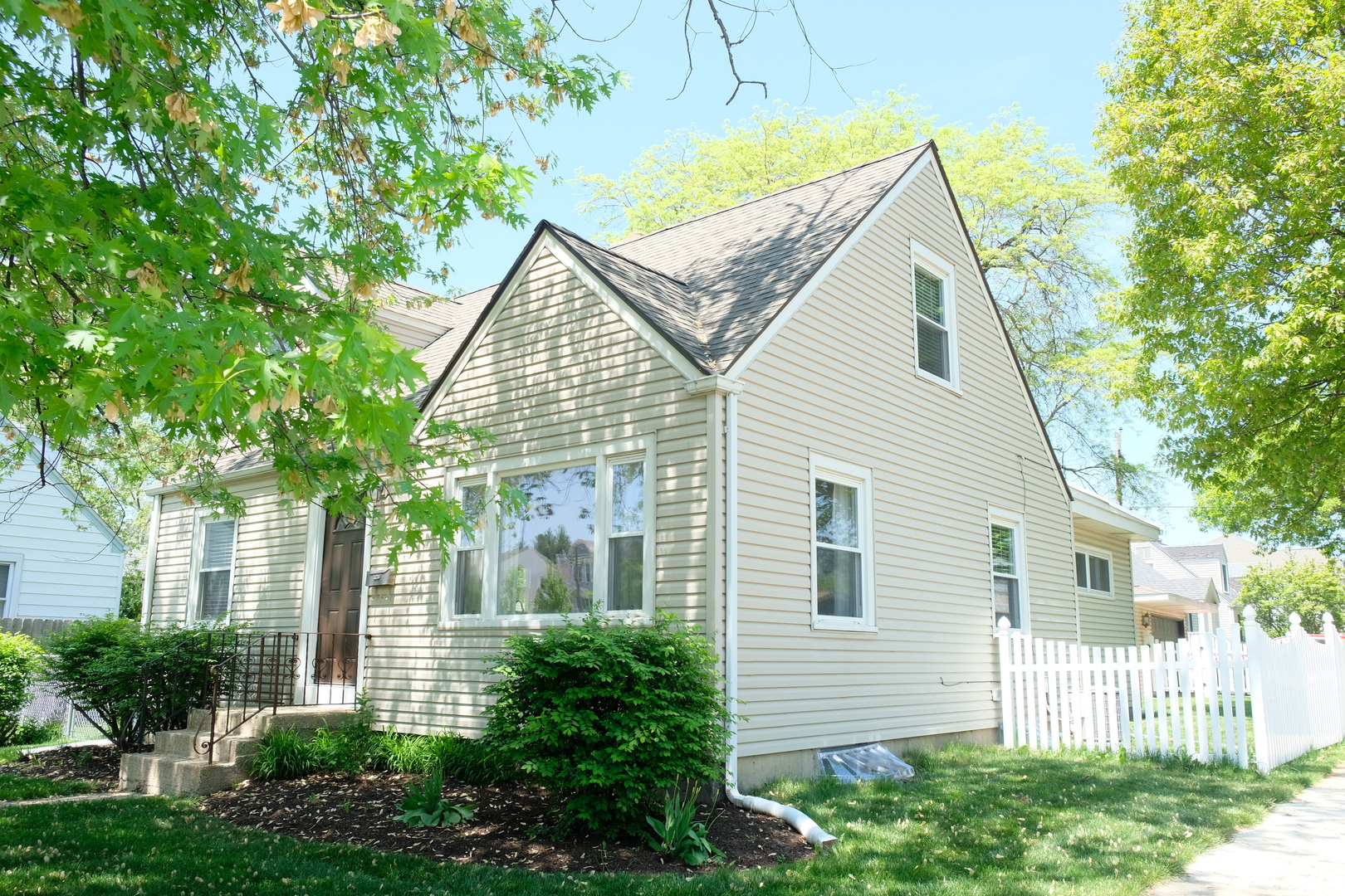 1020 Mitchell Avenue Elmhurst, IL 60126 - Photo 36 of 44 a view of a house with a yard and plants