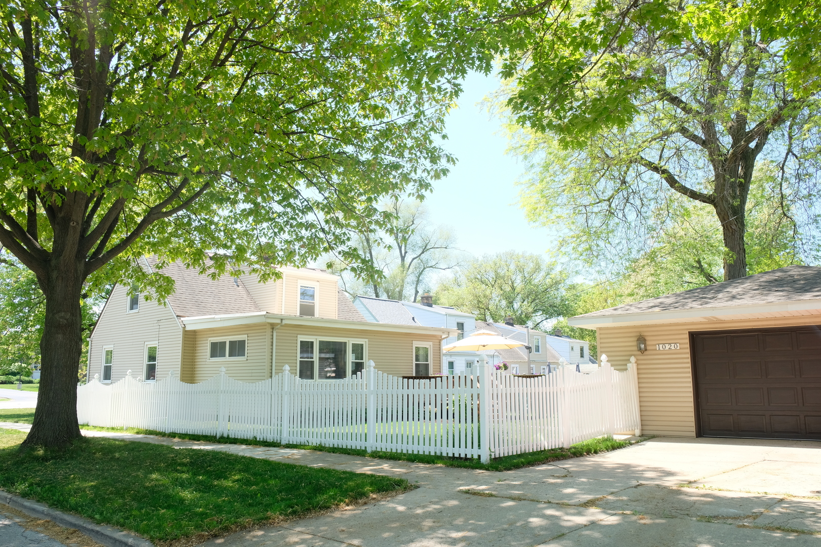 1020 Mitchell Avenue Elmhurst, IL 60126 - Photo 38 of 44 a front view of a house with a yard