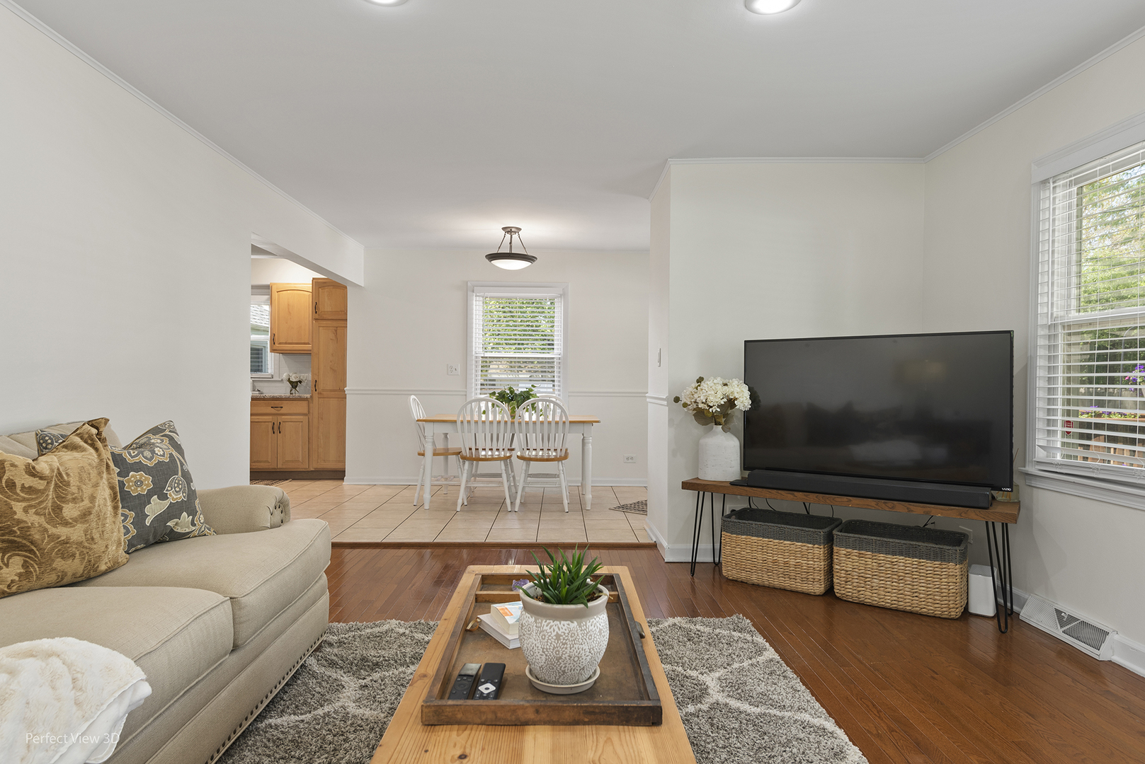 1020 Mitchell Avenue Elmhurst, IL 60126 - Photo 10 of 44 a living room with furniture and a flat screen tv
