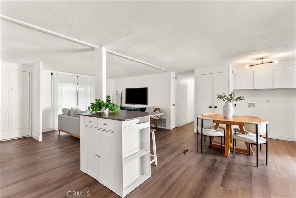 300 North Rampart Street, Unit 127 Orange, CA 92868 - Photo 13 of 37 Living Room area of the home at 300 N Rampart St TRAILER 127, Orange, CA. Features ample natural light and open-concept design