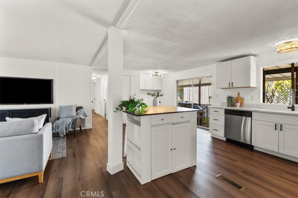 300 North Rampart Street, Unit 127 Orange, CA 92868 - Photo 17 of 28 Living Room area of the home at 300 N Rampart St TRAILER 127, Orange, CA. Features ample natural light and open-concept design