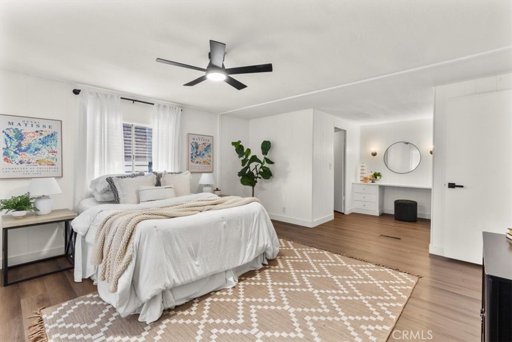 300 North Rampart Street, Unit 127 Orange, CA 92868 - Photo 19 of 37 Master Bedroom of the home at 300 N Rampart St TRAILER 127, Orange, CA. A bright and spacious private retreat