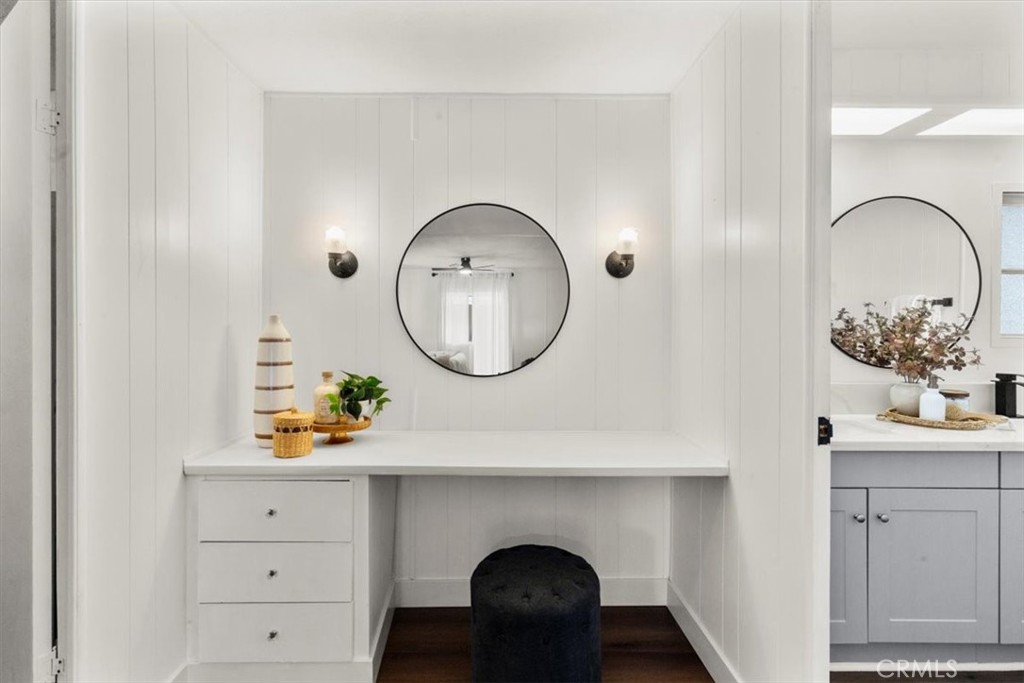 300 North Rampart Street, Unit 127 Orange, CA 92868 - Photo 21 of 28 Bathroom of the home at 300 N Rampart St TRAILER 127, Orange, CA. Features a modern vanity and a shower/tub combination.