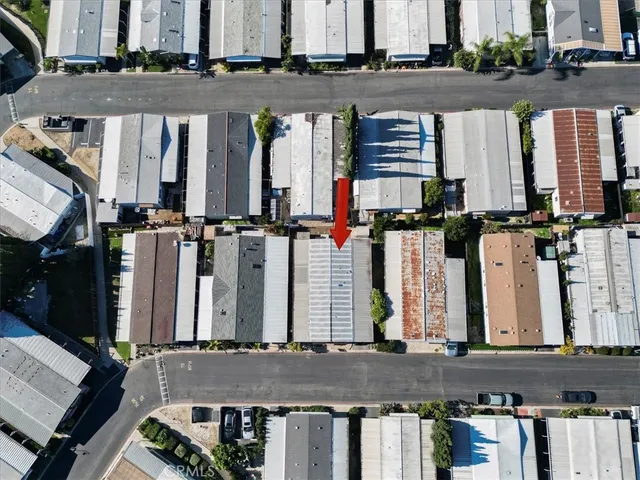 an aerial view of a multi story residential apartment building