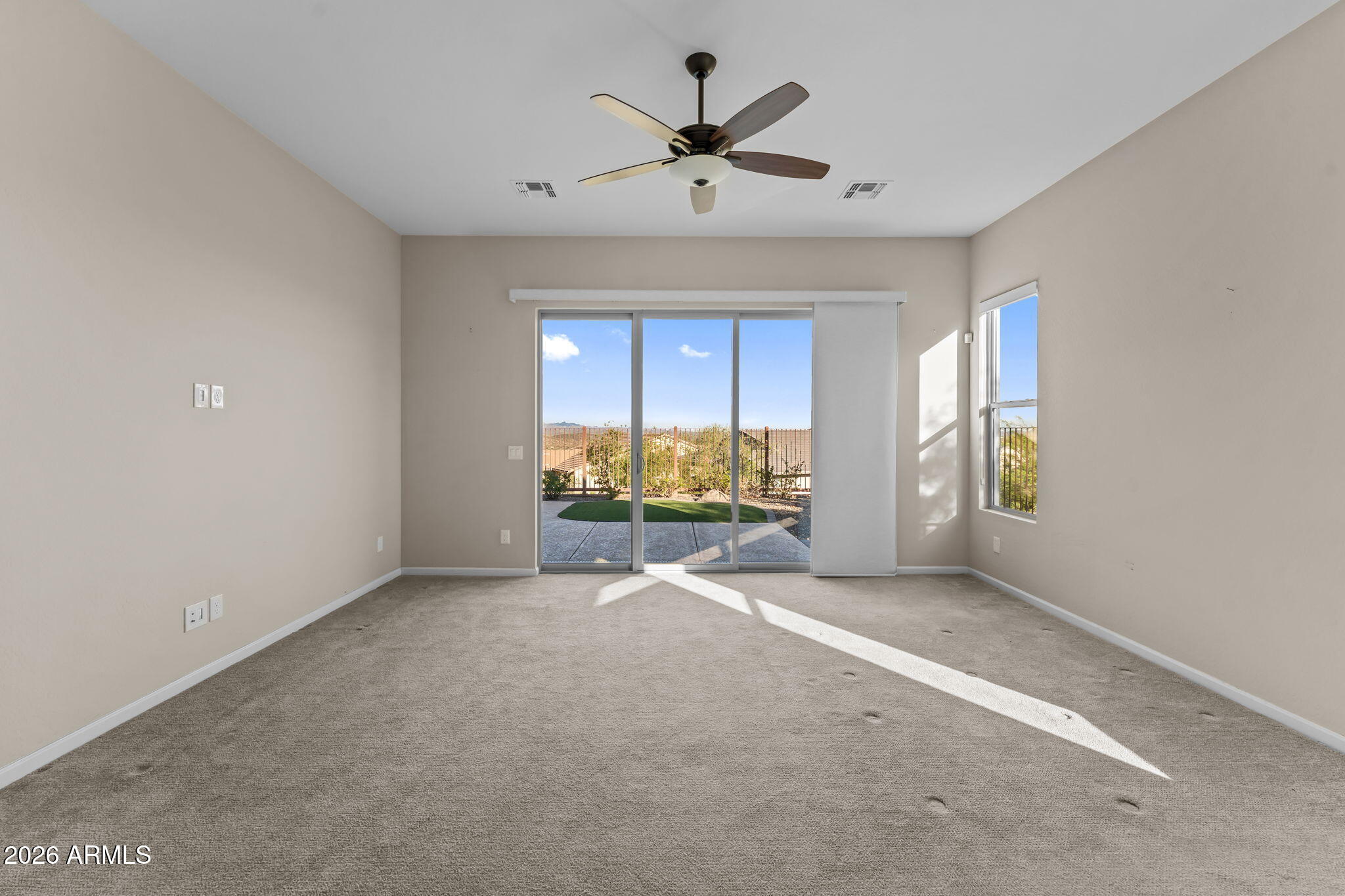3675 Gold Ridge Road Wickenburg, AZ 85390 - Photo 21 of 58 a view of room with window and ceiling fan