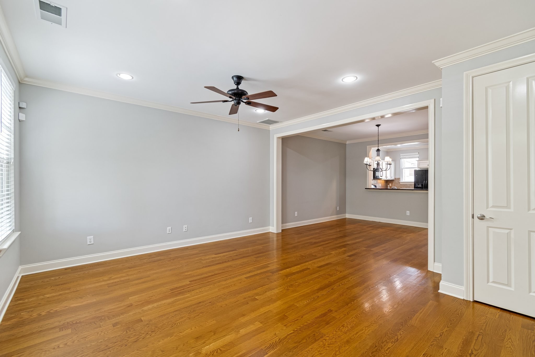 318 Byron Way Franklin, TN 37064 - Photo 7 of 53 wooden floor in an empty room with a window