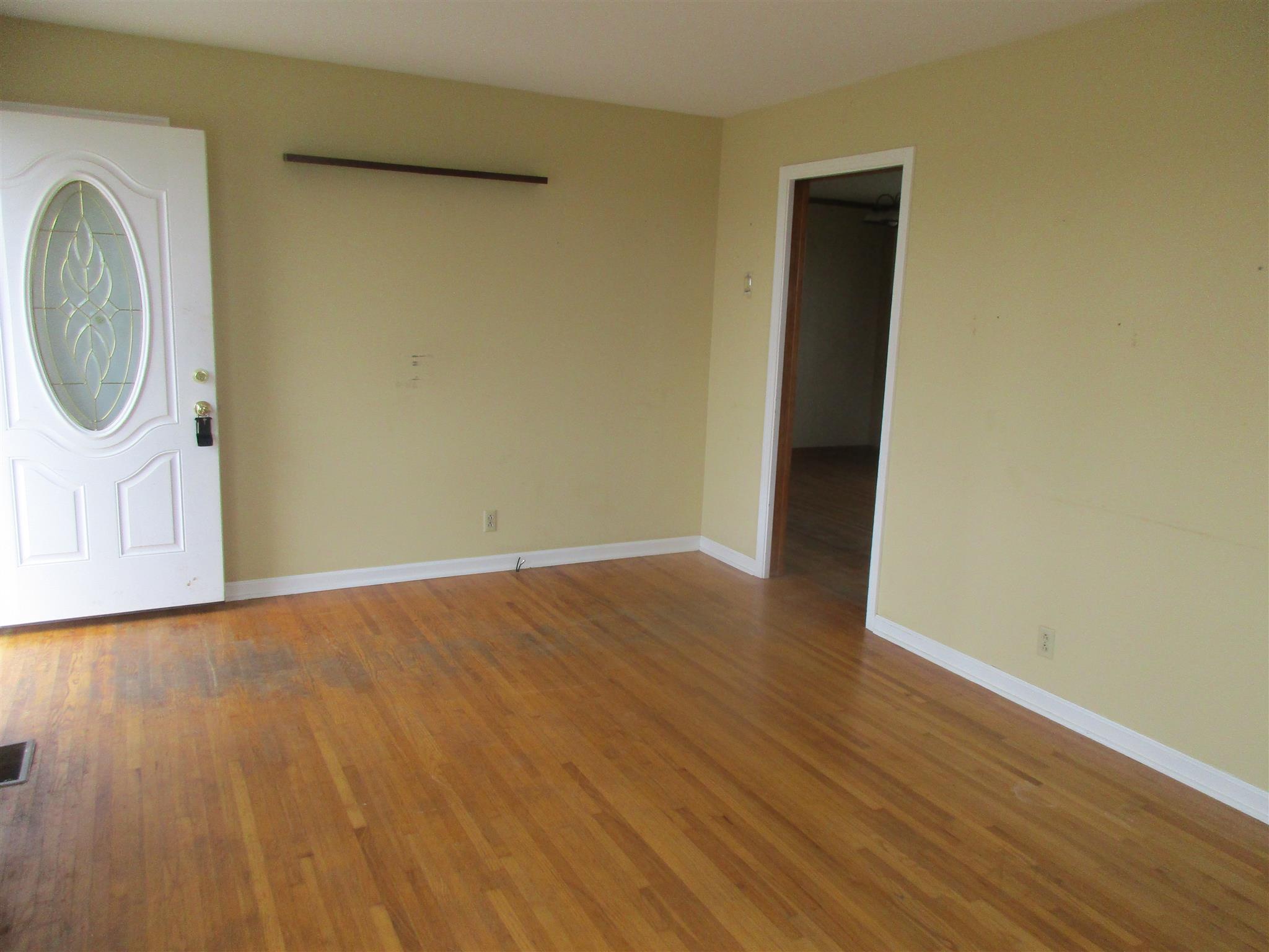 3779 Buck Road Clarksville, TN 37043 - Photo 5 of 12 a view of a storage & utility room with wooden floor