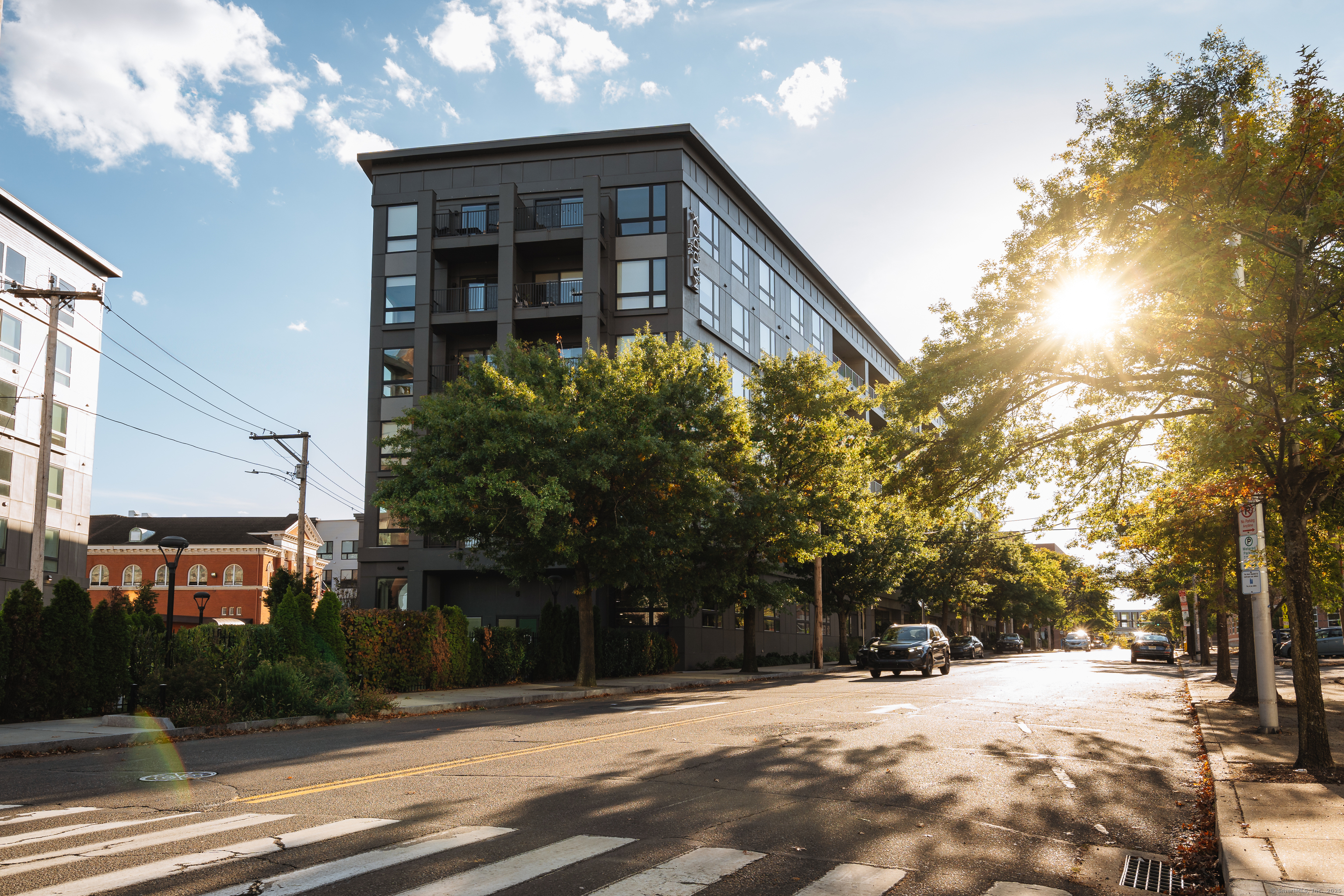 240 Congress Avenue, Unit 606 New Haven, CT 06519 - Photo 6 of 8 a view of a house with a yard