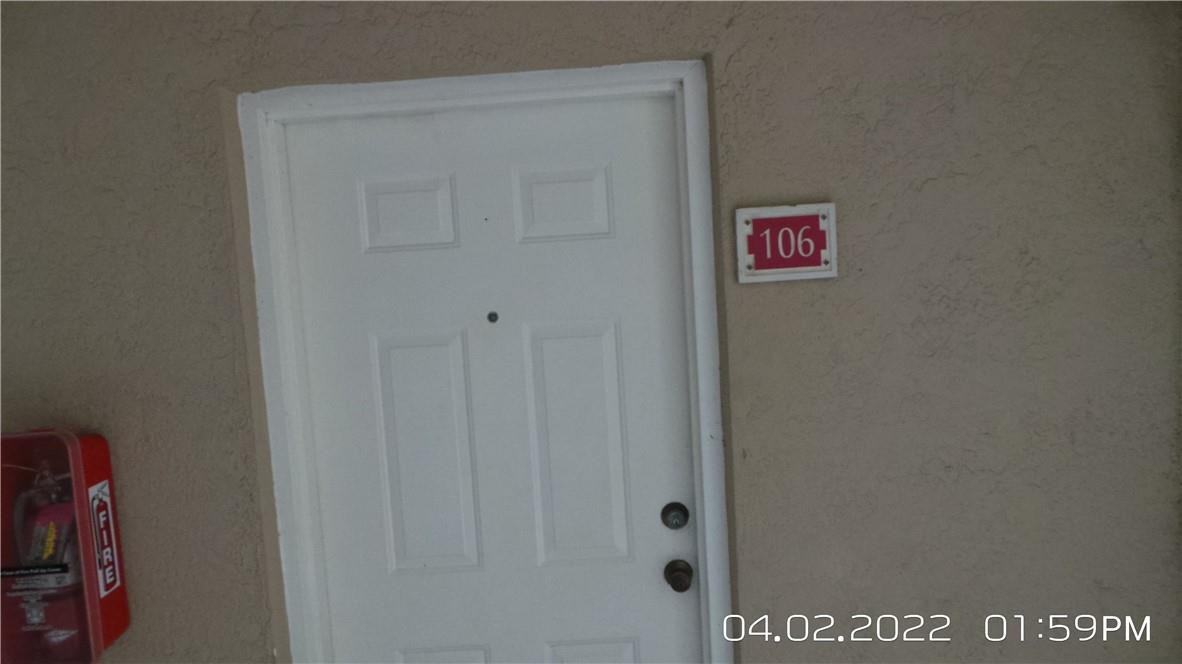 5001 Wiles Road, Unit 106 Pompano Beach, FL 33073 - Photo 19 of 31 a close up of a door