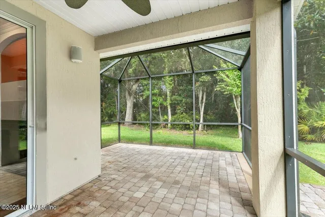 a view of a house with backyard and garden