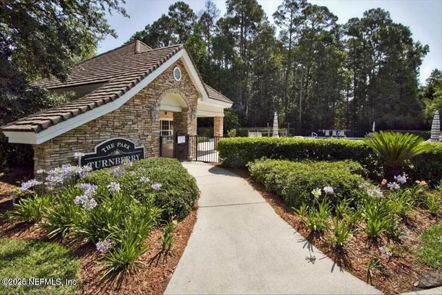 a view of a swimming pool with a yard