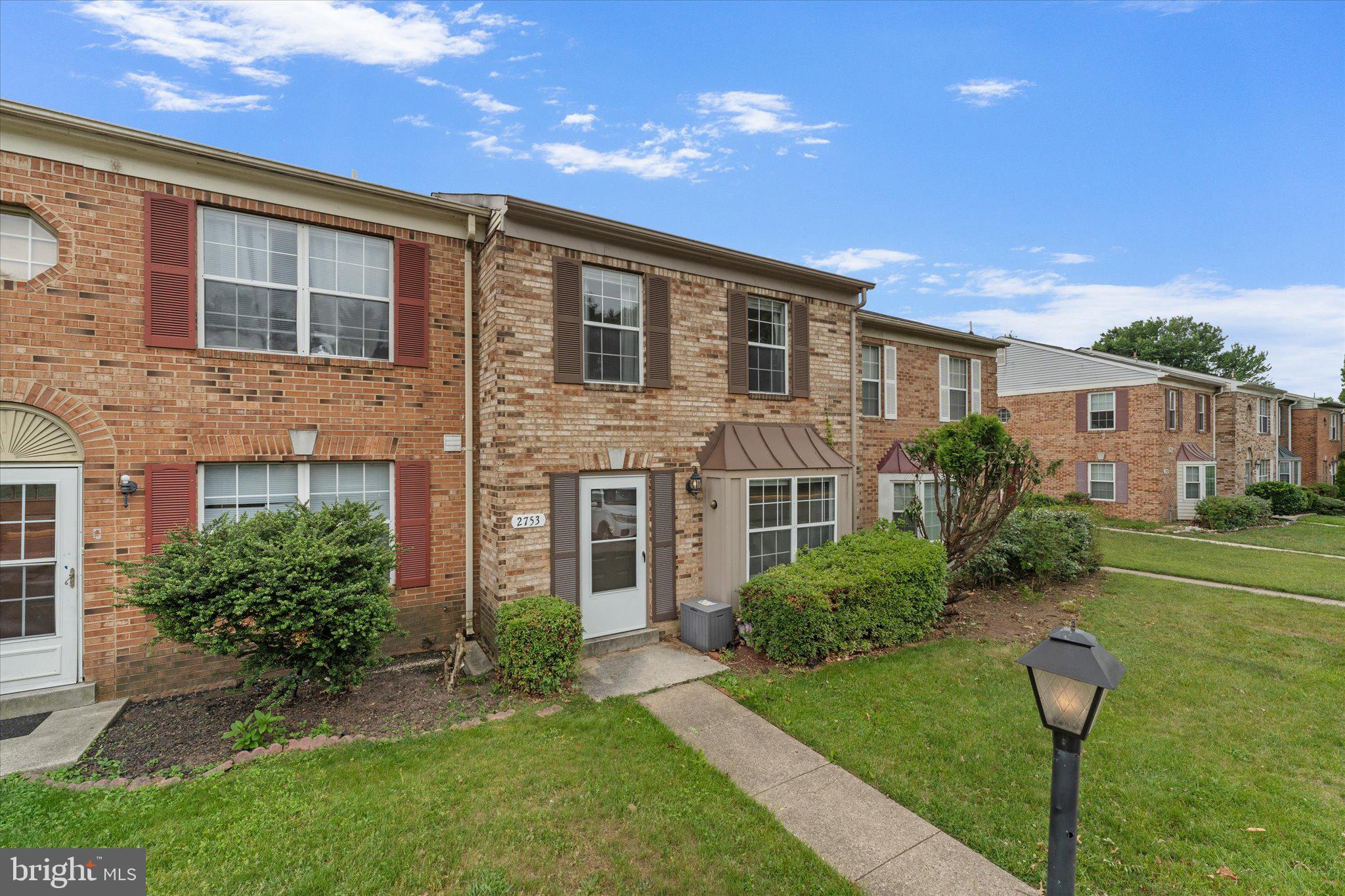 2753 Bixby Road Woodbridge, VA 22193 - Photo 1 of 22 a front view of a house with garden
