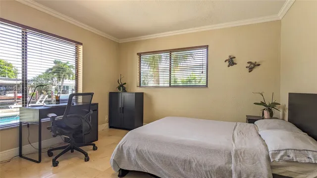 a bedroom with a bed and a table