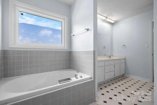 a bathroom with a bathtub sink and toilet