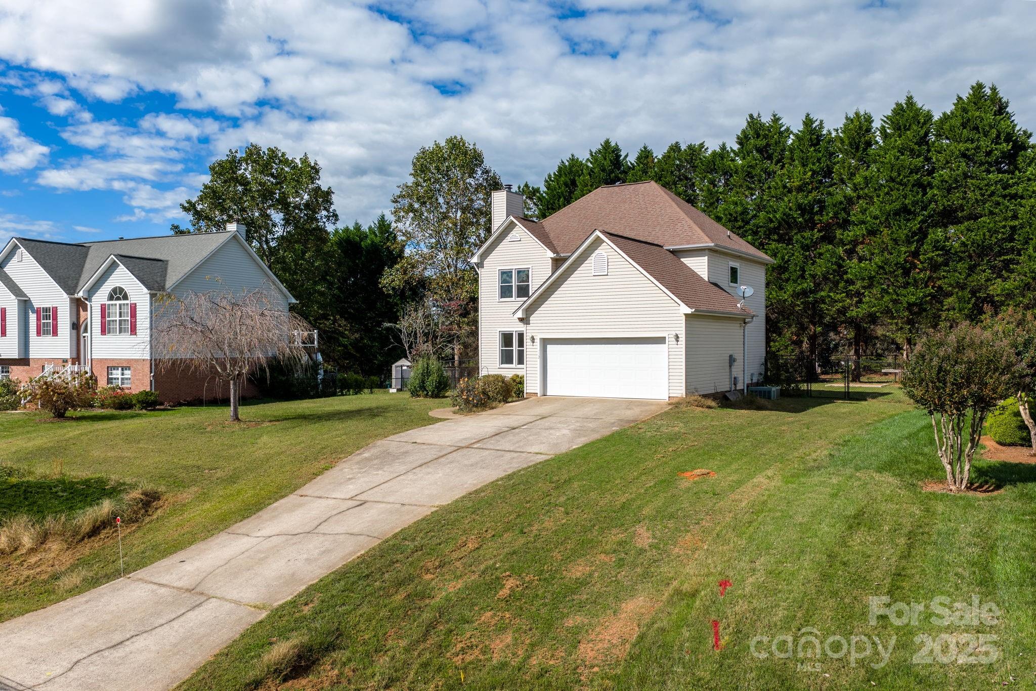 712 Painted Feather Lane Conover, NC 28613 - Photo 30 of 48 a front view of a house with garden